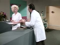 In the doctor's clinic, the sultry redhead nurse licks the massive, black jock.